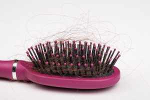 Comb with hairs on